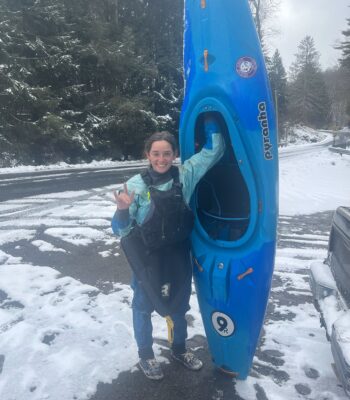 girl-in-front-of-snowy-kayak