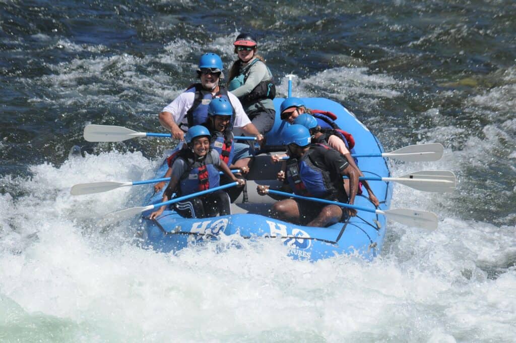 group-of-rafters-on-river