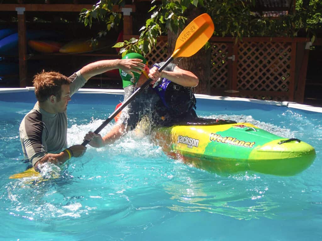 Learning to roll a kayak in the pool