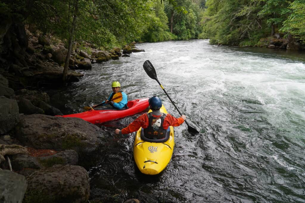 2 whitewater kayakers on the White Salmon River