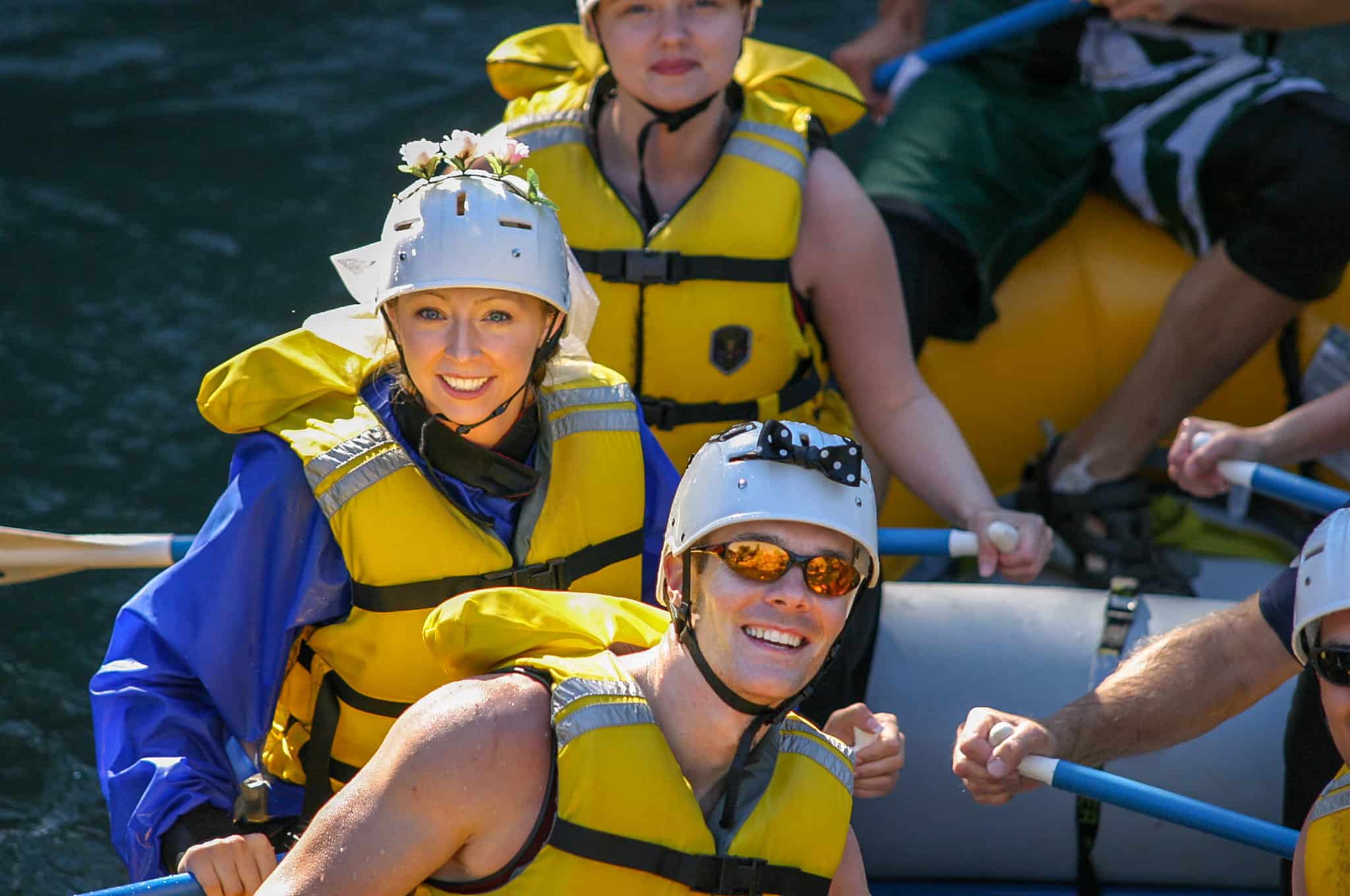 Wedding couple on a whitewater raft