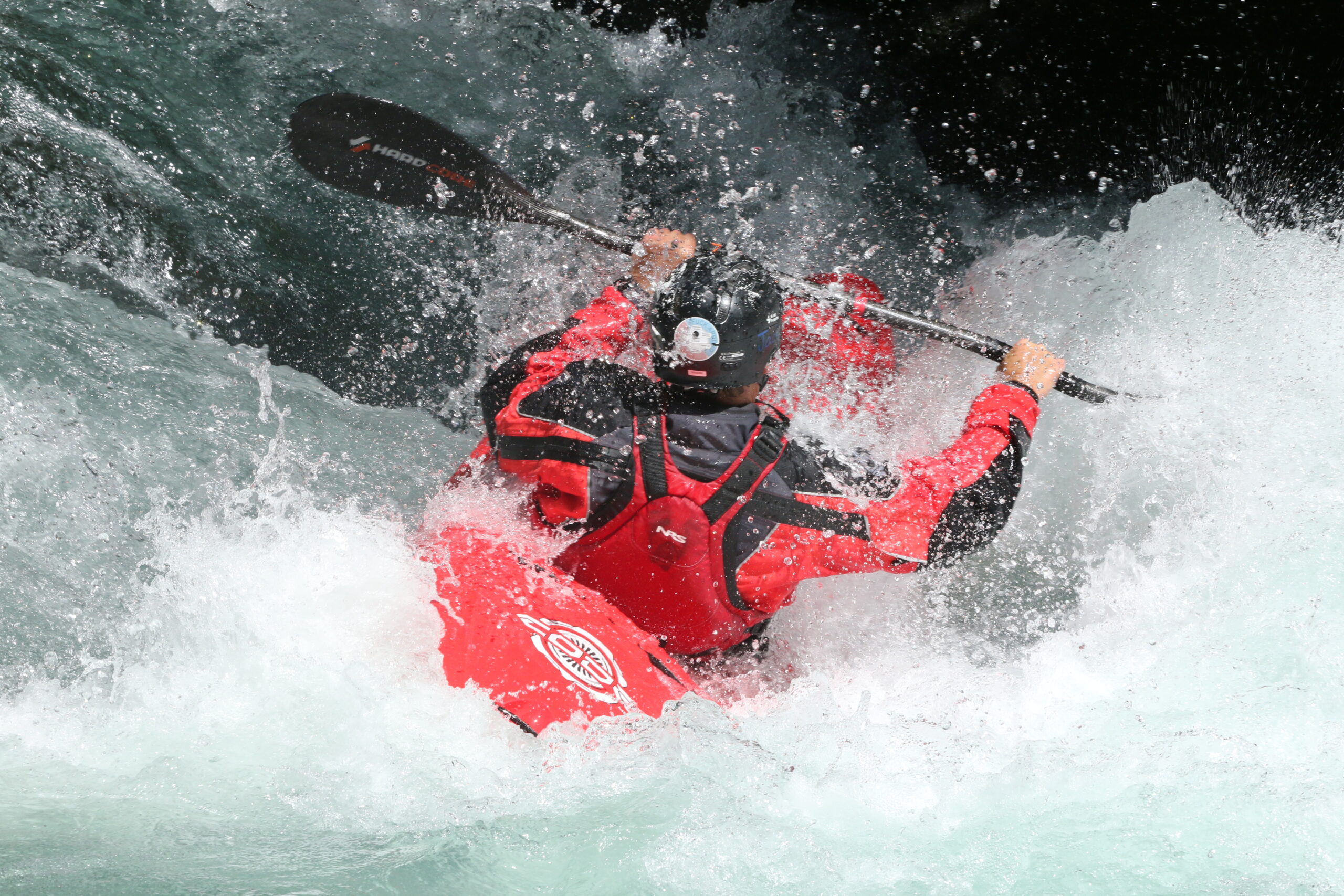 Whitewater kayaker in a rapid
