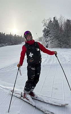 Adelaide Brandt in ski patrol gear on the slopes