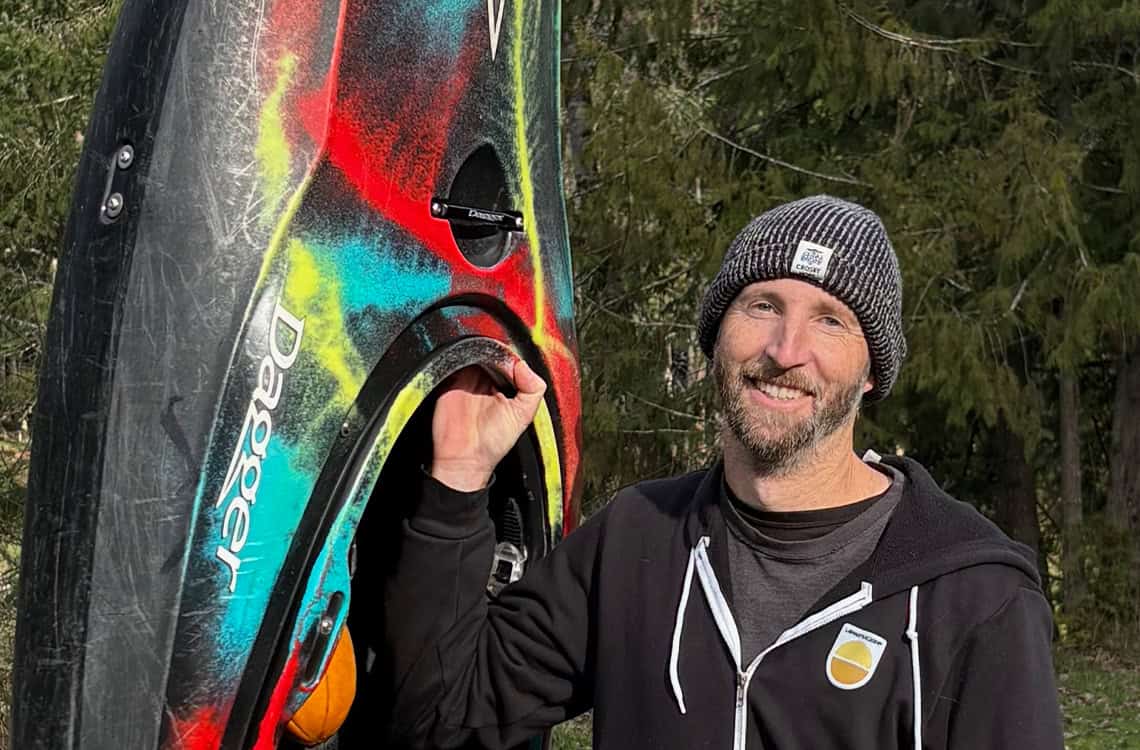 Profile photo of Chris Smith holding his Dagger Kayak.