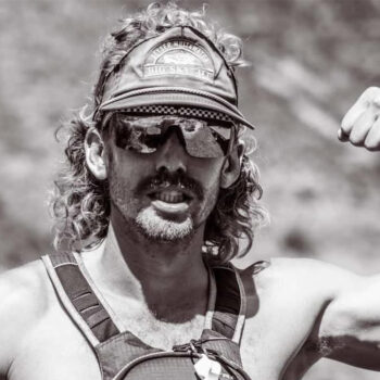 black and white profile photo of Eric Ortiz