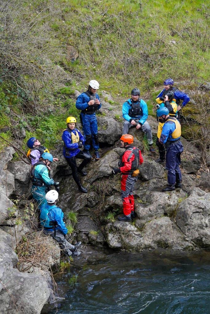 Riverside discussions during swiftwater rescue training