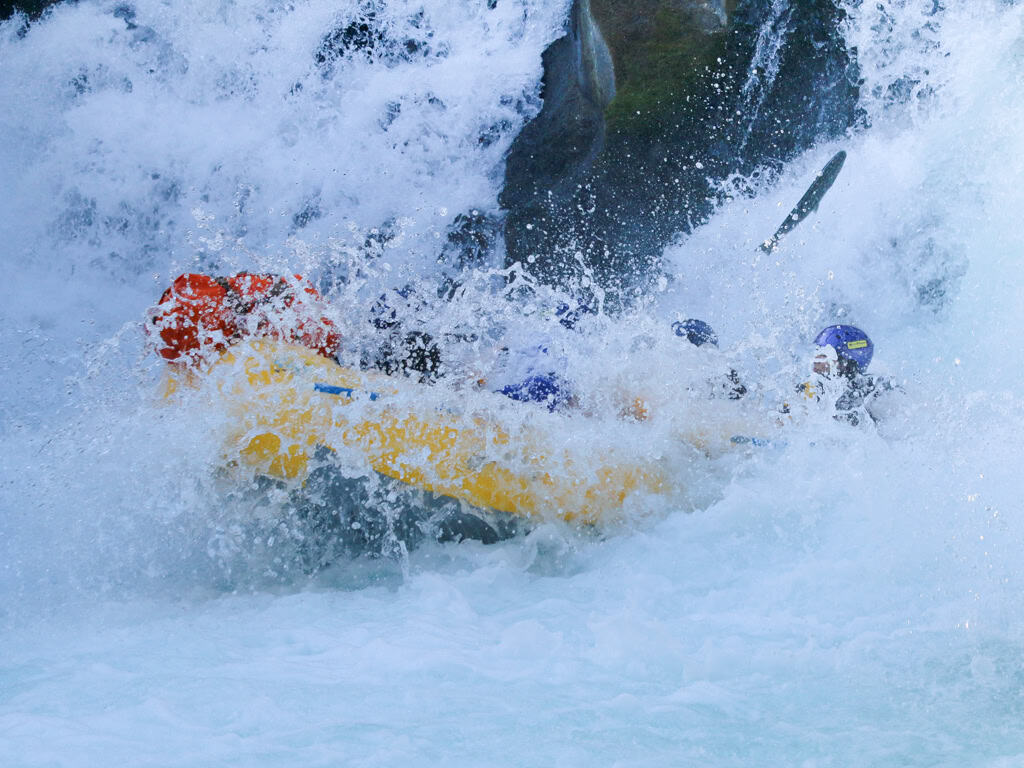 Salmon jumping HuSum Falls with raft