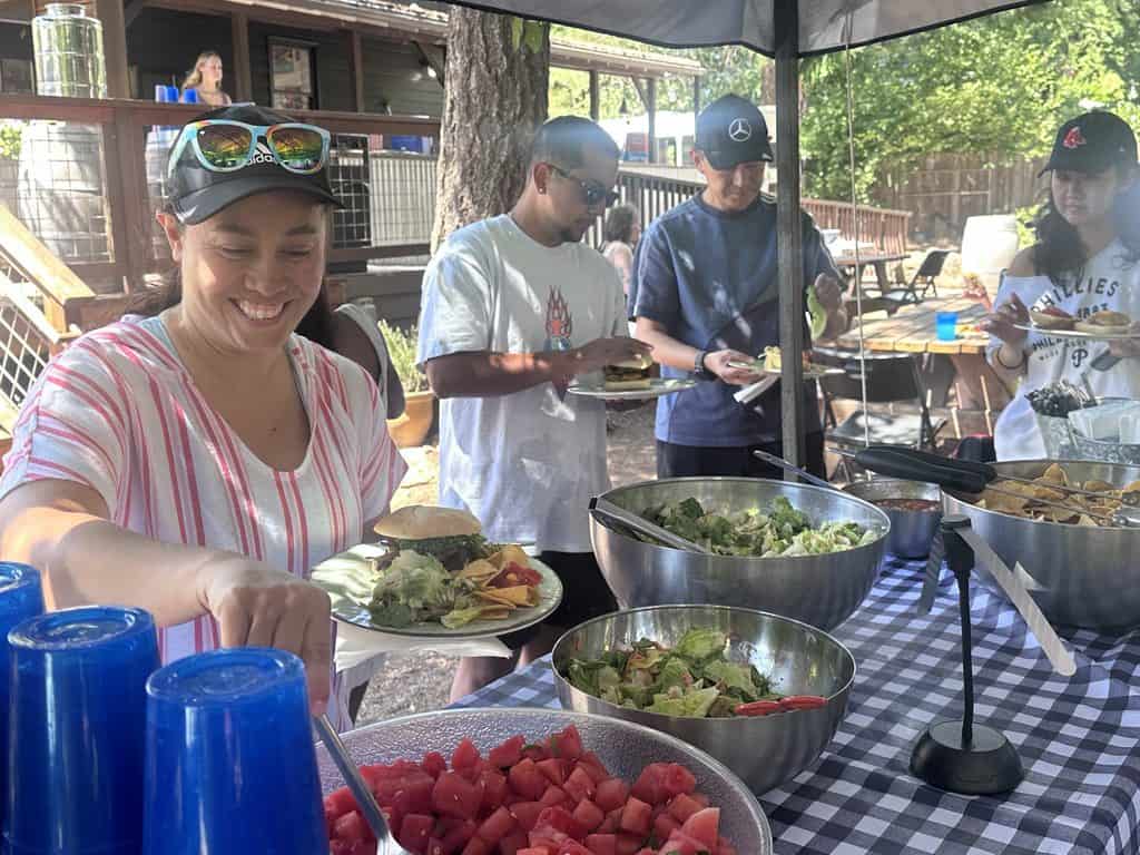 Guests enjoying a delicious spread at their BBQ