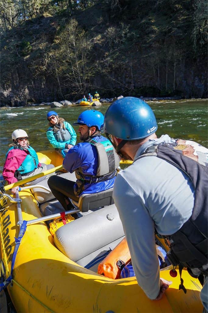 Wet Planet rowing school instructor gives feedback to student on the Hood River in Oregon. 
