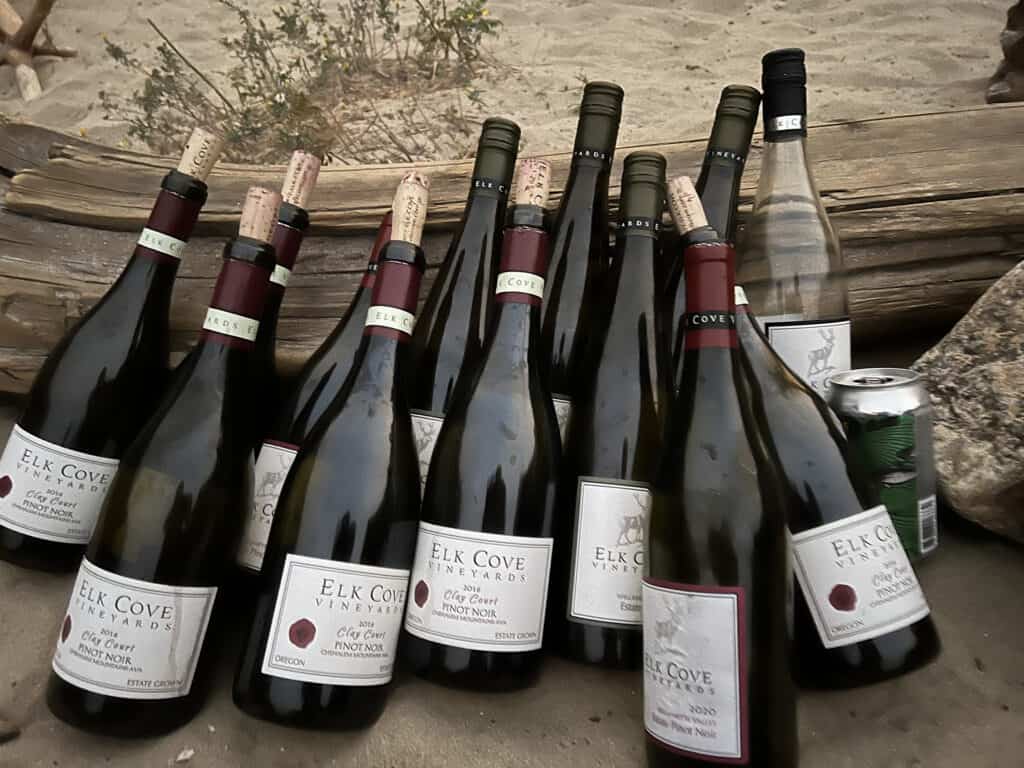 Elk Cove Vineyards wine on riverside beach