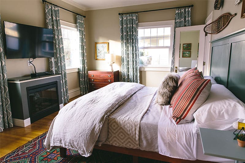 Warm design in the bedroom of Lodge 902. Wet Planet Whitewater in Washington, Idaho, Oregon