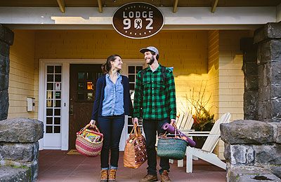 Two guests are ready for a picnic and yoga as they leave Lodge 902. Wet Planet Whitewater in Washington, Idaho, Oregon