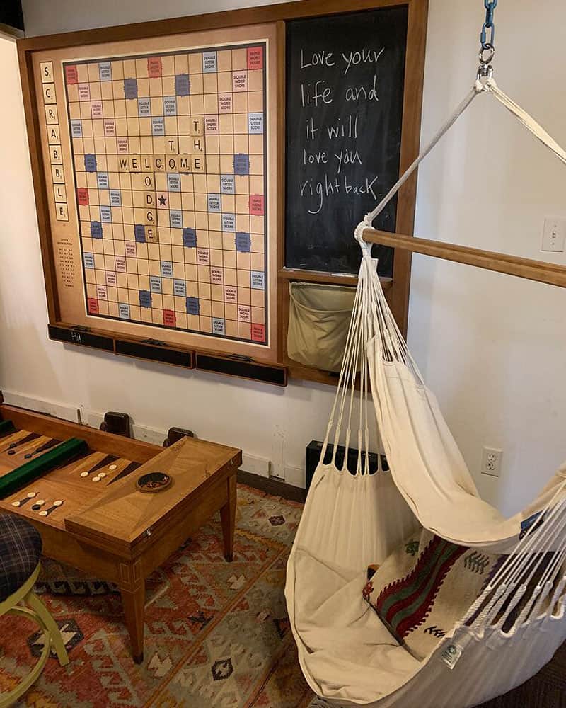 Lodge 902 room has Scrabble on the wall and a hammock. Wet Planet Whitewater in Washington, Idaho, Oregon