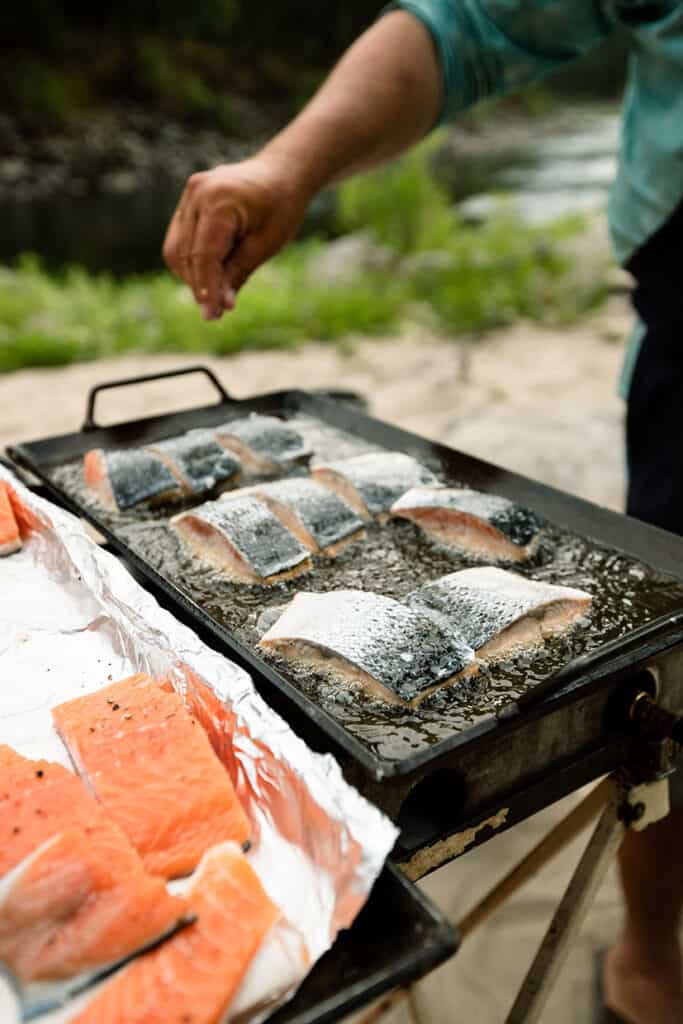 Salmon cooking at camp