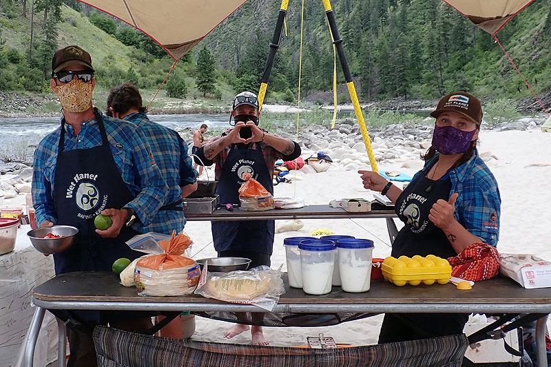 guides cooking what you eat on a multi-day rafting trip