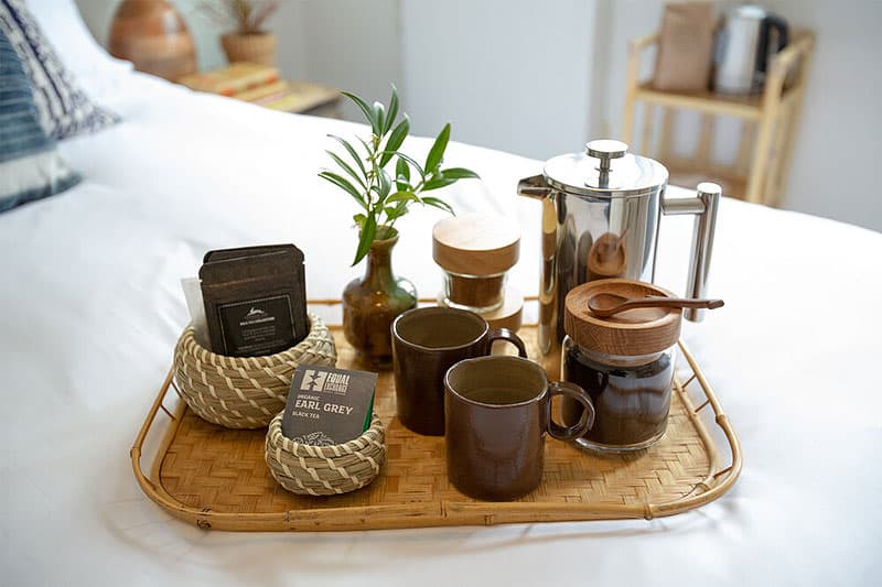 morning coffee tray on bed at the Ruby June Inn. Wet Planet Whitewater in Washington, Idaho, Oregon