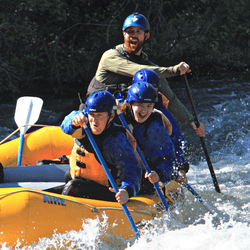 steve merrow guiding smiling rafting guests