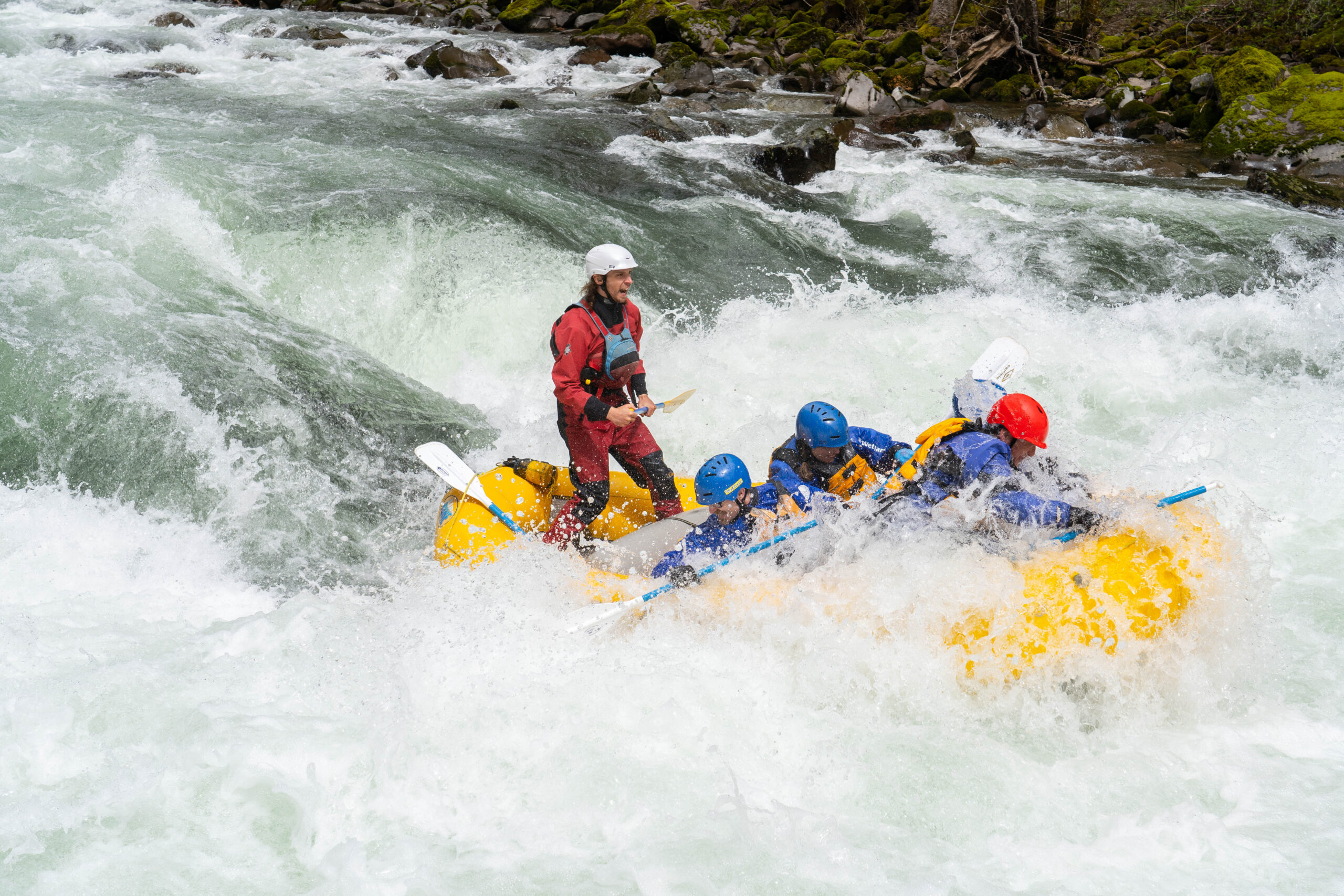 Group of people going into a rapid on the Wind River