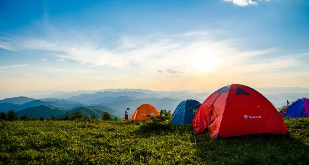 Camping tents outside with beautiful scenery