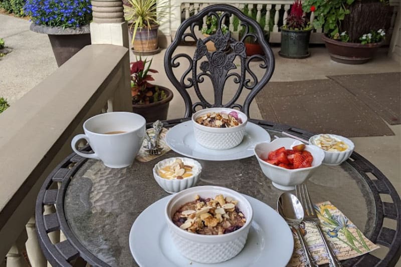 Outdoor seating for pie, fruit and coffee for breakfast at the Oak Street Hotel. Wet Planet Whitewater in Washington, Idaho, Oregon