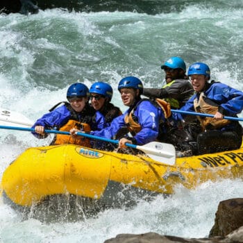 Rafters challenging the whitewater on a Wind River rafting trip in Washington