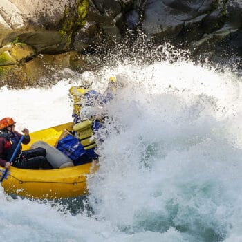 An exciting class V rapid, The Flume, on a Wind River rafting trip.